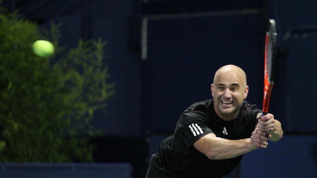 LOS ANGELES, CA. - JULY 24: Andre Agassi (pictured) and John McEnroe play a charity match at the Farmers Classic on July 24 2010 in Los Angeles.