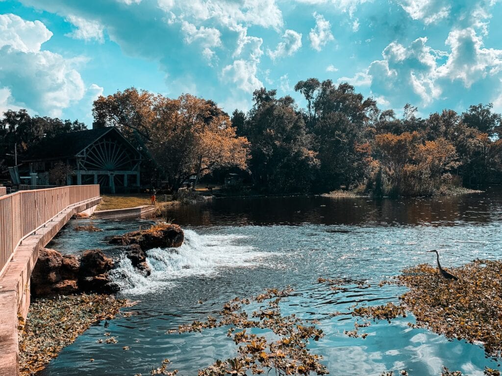 Beautiful cloudy day at Ponce de Leon Springs State Park, which features a sugar cane mill that was once powered by the spring in the 1830's, shown in the background.