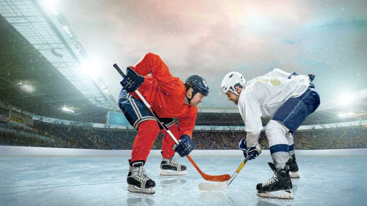 Ice hockey player on the ice. Open stadium - Winter Classic game.