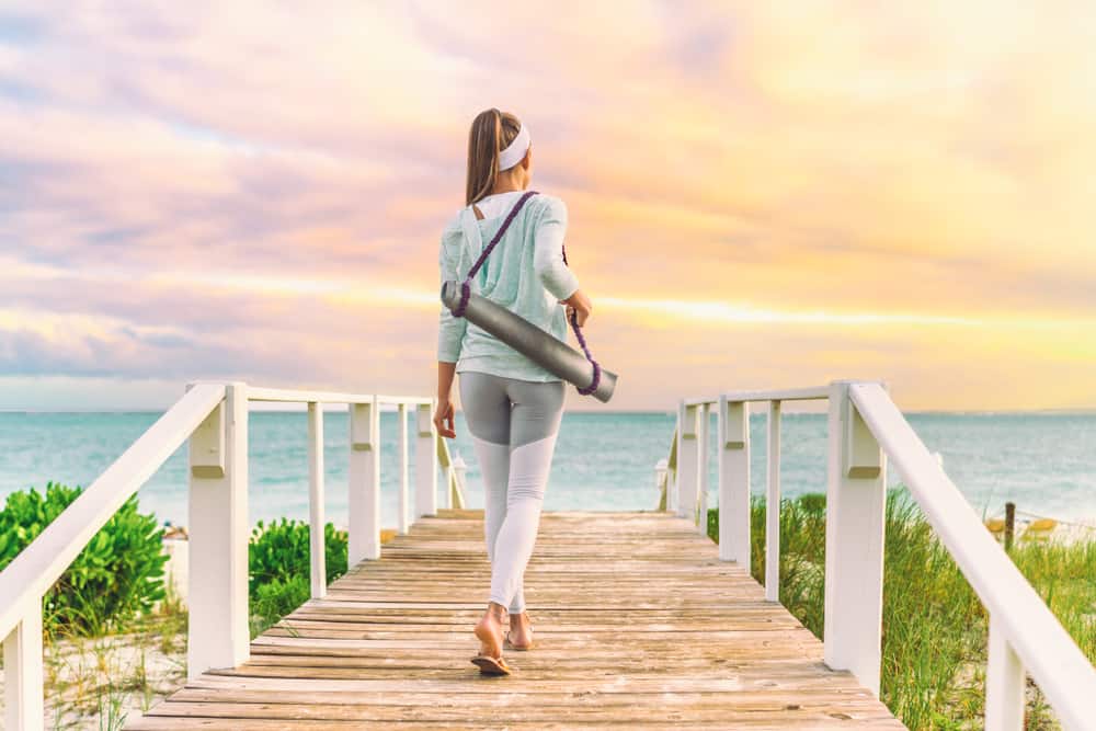 woman walking on dock