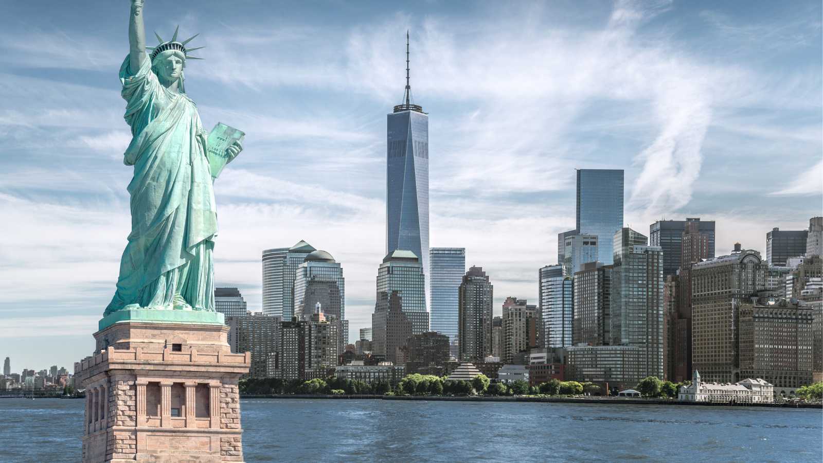 The statue of Liberty with World Trade Center background, Landmarks of New York City