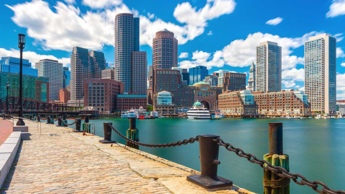 Boston skyline in sunny summer day, view from harbor on downtown, Massachusetts, USA