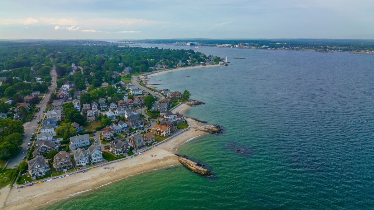 Pequot Point Beach and New London Harbor Lighthouse at the mouth of Thames River in city of New London, Connecticut CT, USA.