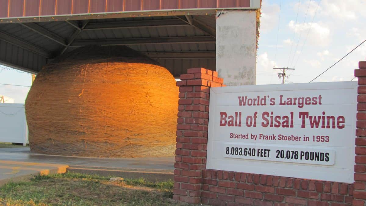 The world's largest ball of sisal twine sits proudly under a protective canopy in Cawker City, KS.