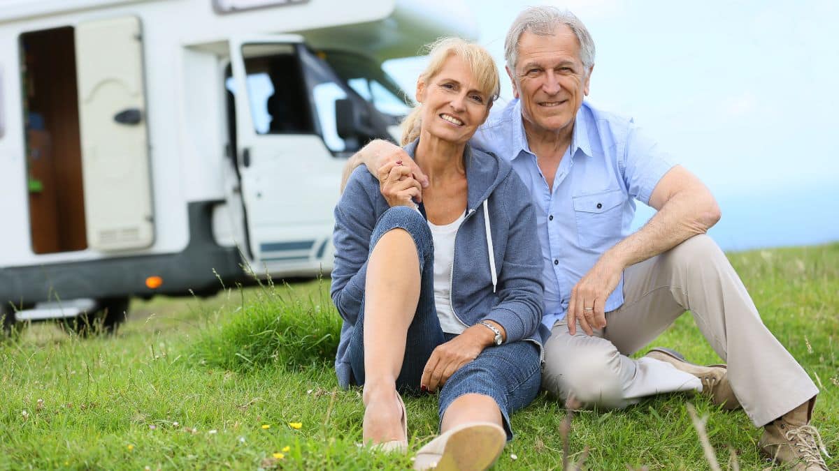 couple with their camper van