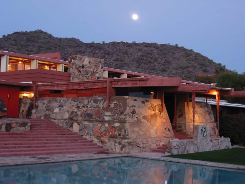 The exterior of Frank Lloyd Wright's Taliesin West at night.