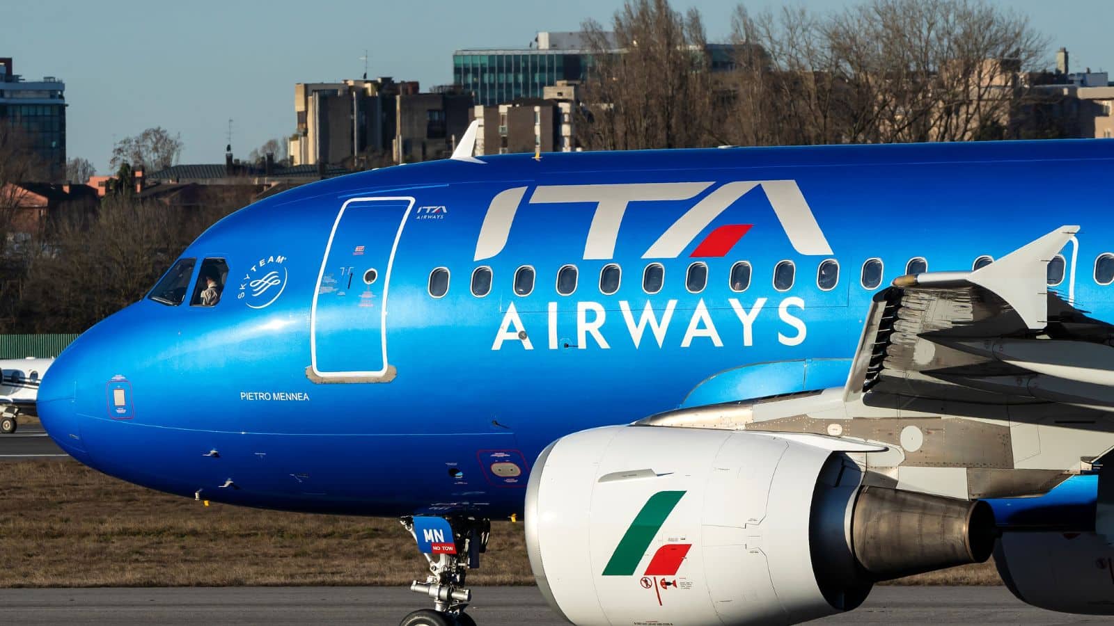 MILAN LINATE - FEBRUARY 02, 2022: Airbus 319 (EI-IMN) wearing the new livery of ITA Airways, on the runway of Linate Airport